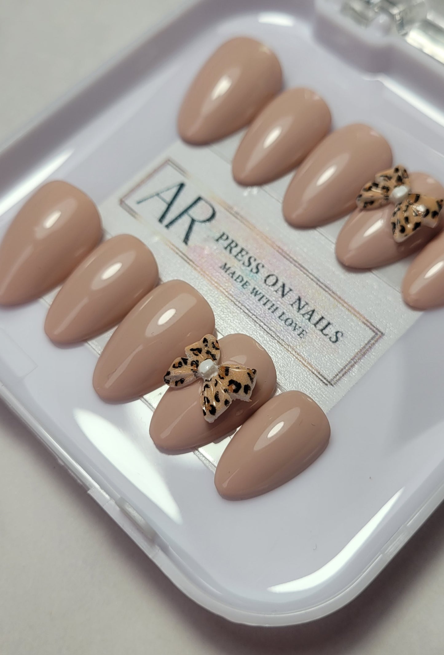 Nude Leopard Bow